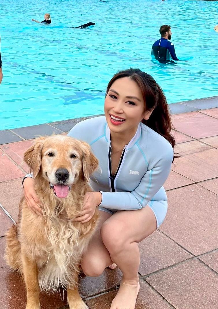 Maxine at a dog friendly swimming pool with Stanley